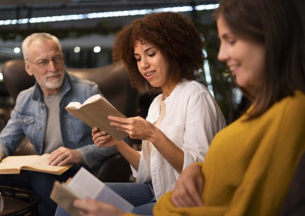 side-view-smiley-people-book-club